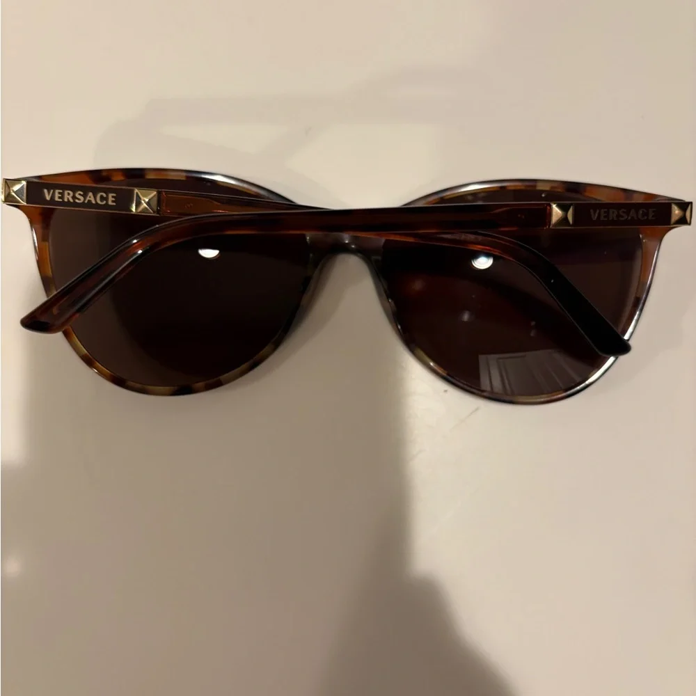 Versace sunglasses featuring